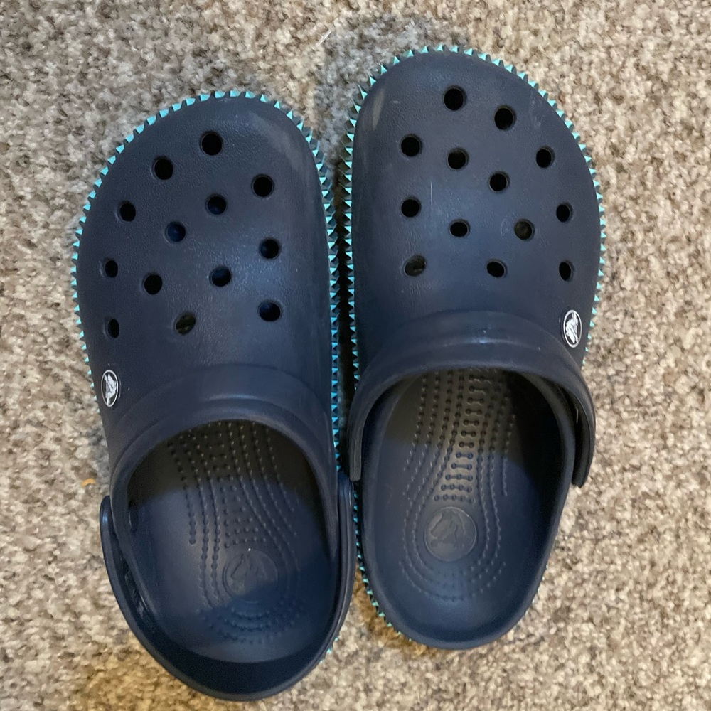 Navy and teal Crocs